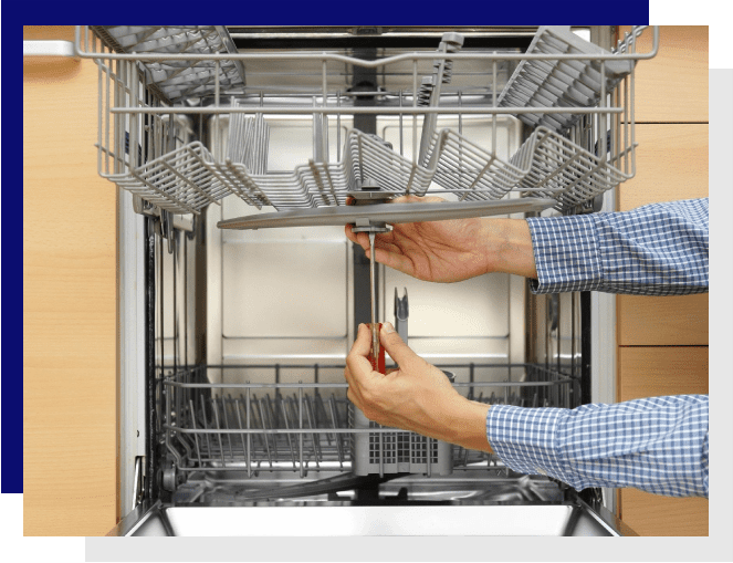 A person is loading the dishwasher with their hands.